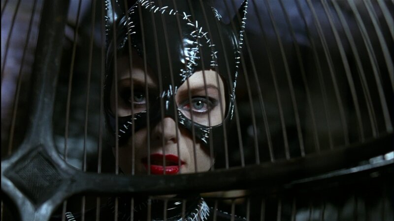 Catwoman in a cage