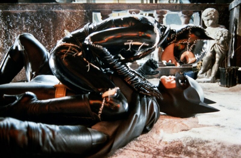 Catwoman overpowering Batman