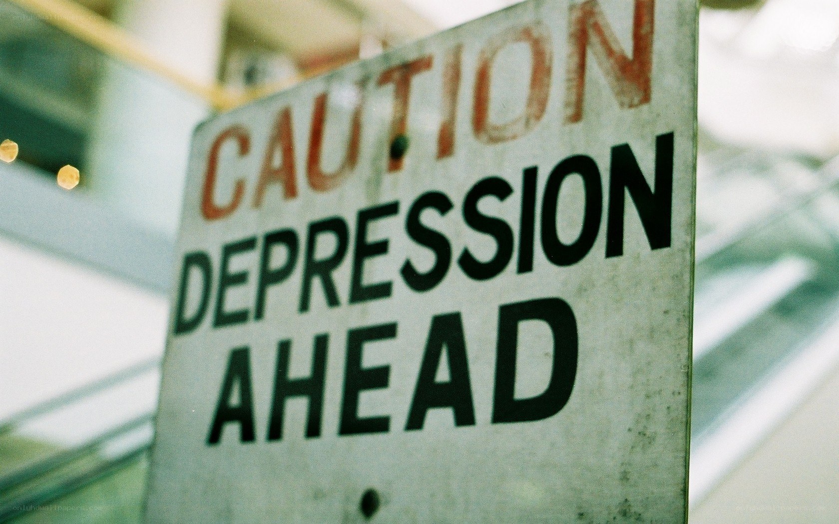 Caution Depression Ahead sign