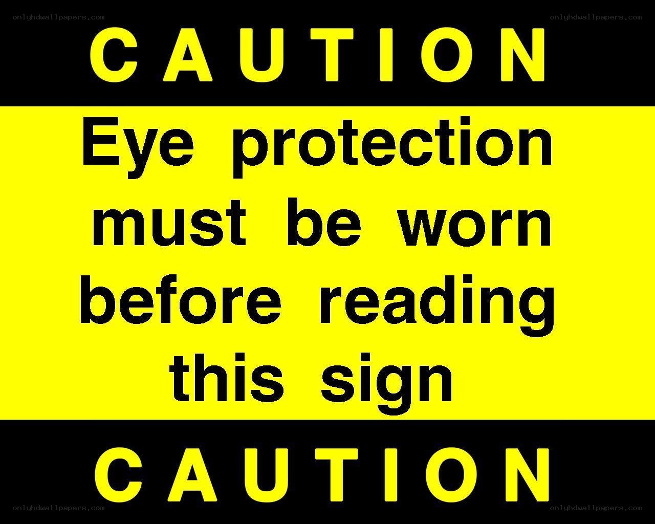 Caution sign with eye protection warning