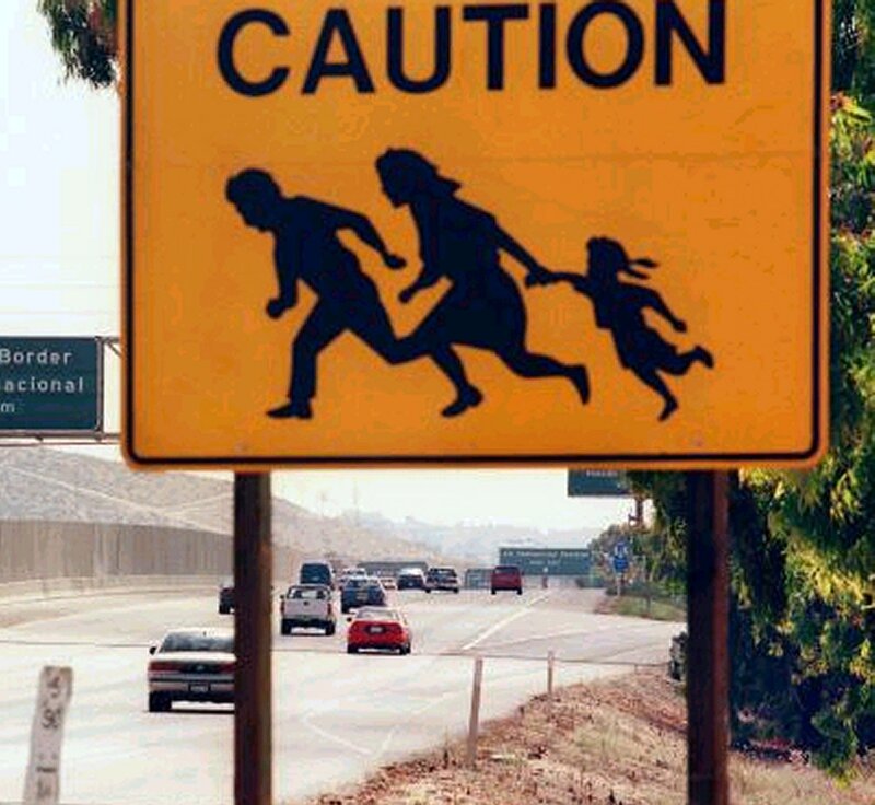 Caution sign with silhouettes