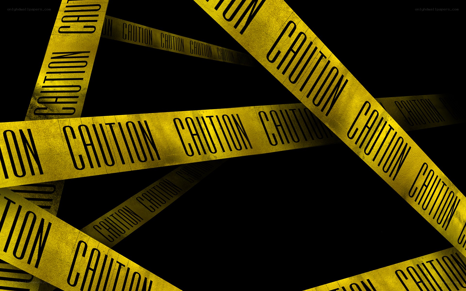 Caution tape on black background