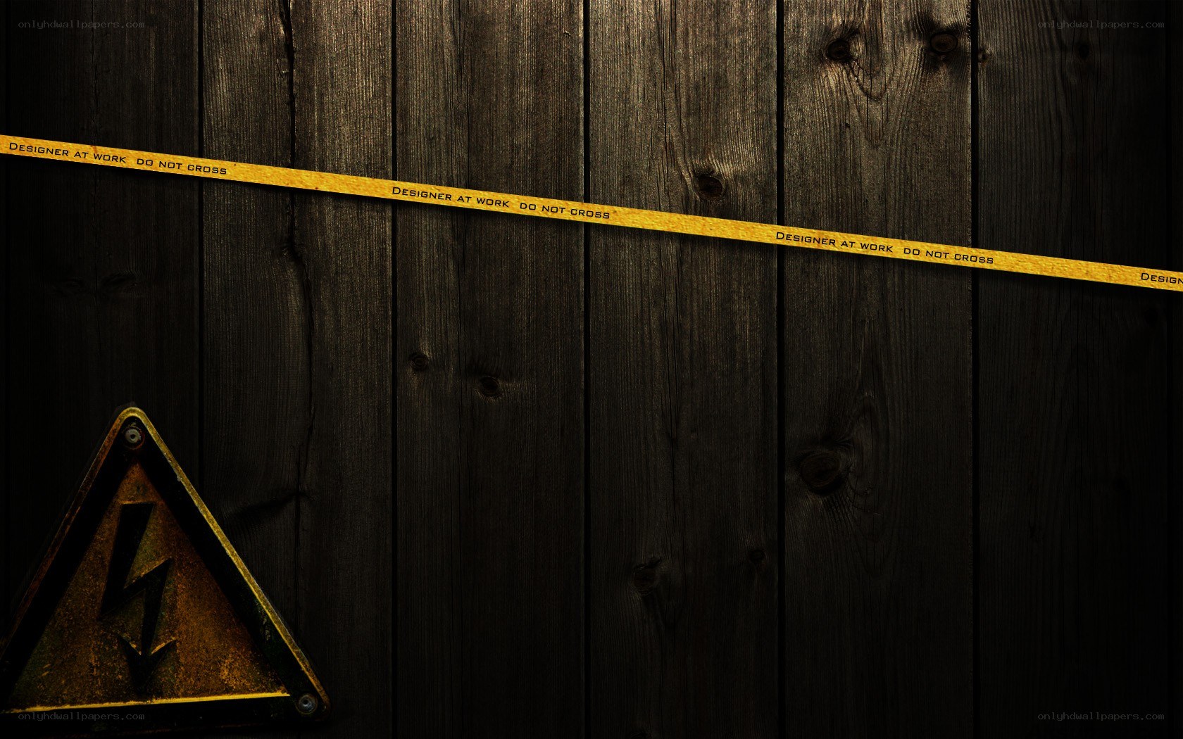 Caution tape on wooden wall