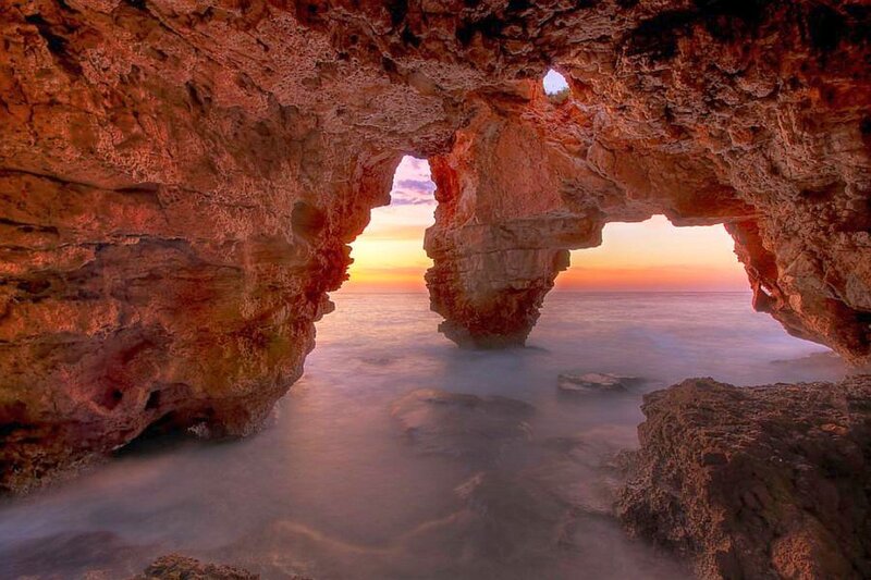 Cave arch at sunset