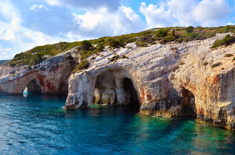Cave arches on a coastal cliff