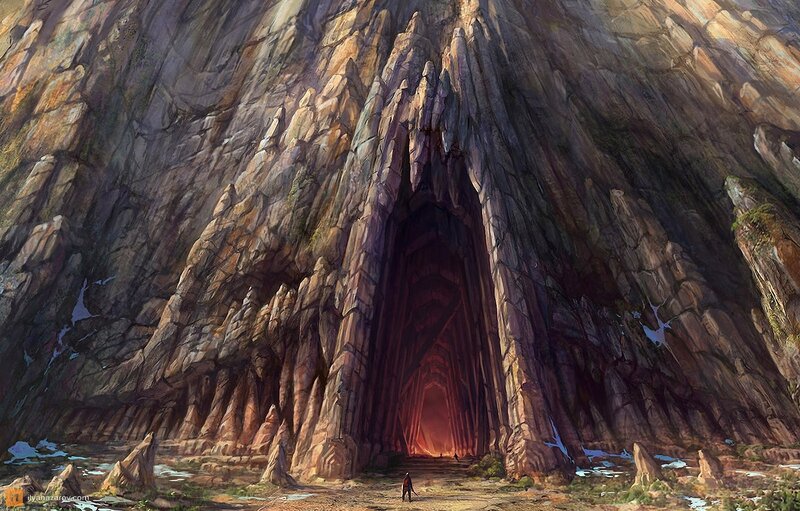 Cave entrance in a rocky cliff