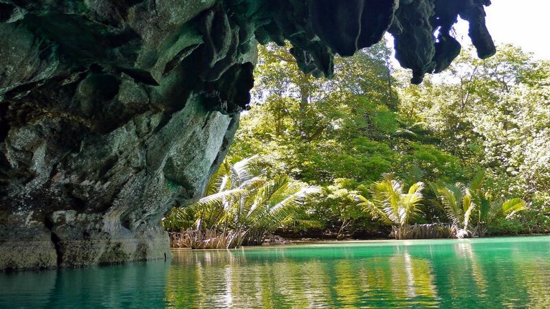 Cave Entrance with Turquoise Water