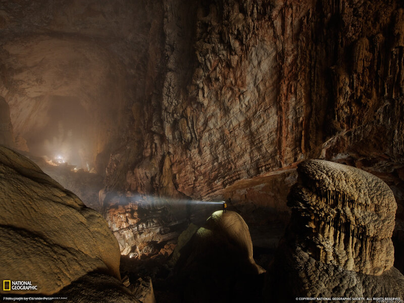 Cave exploration with flashlight