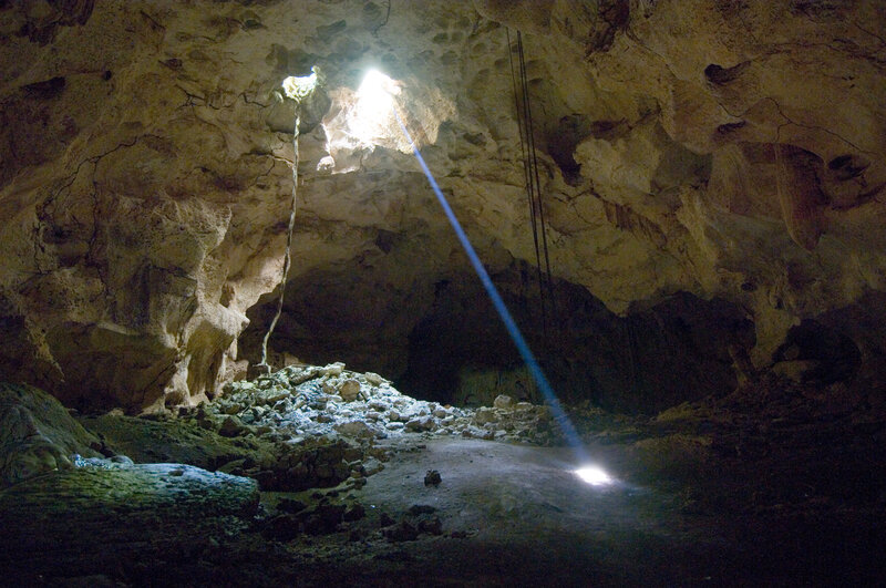 Cave Interior with Light Beam