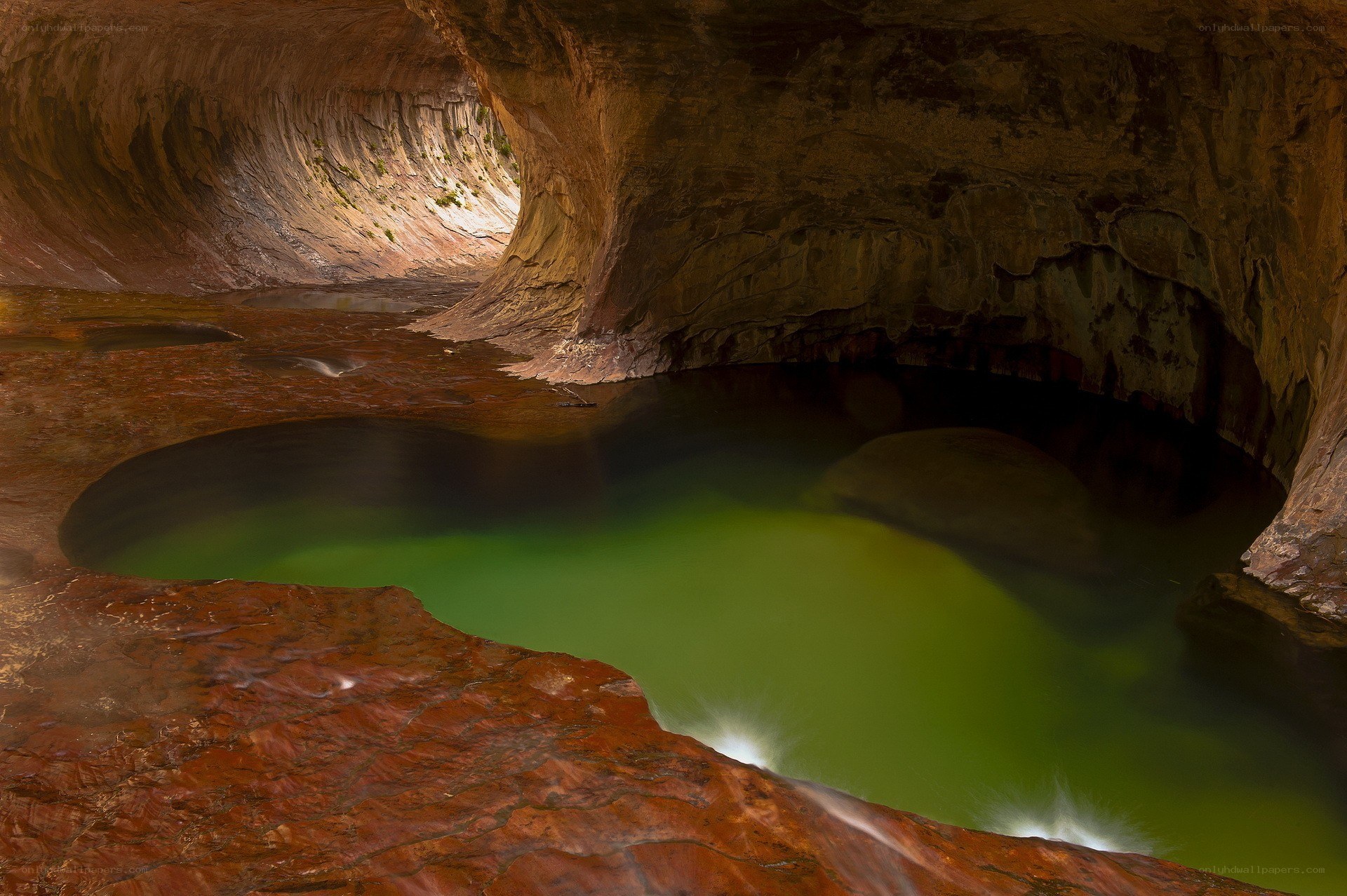 Cave pool with green water