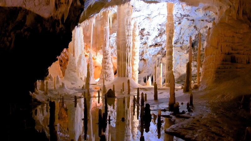 Cave Stalactites and Stalagmites — White, Dramatic