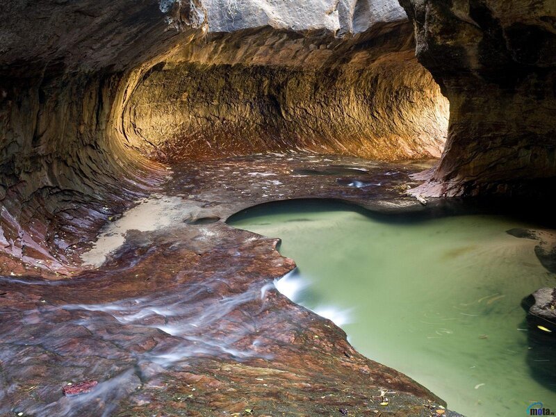 Cave stream with green pool