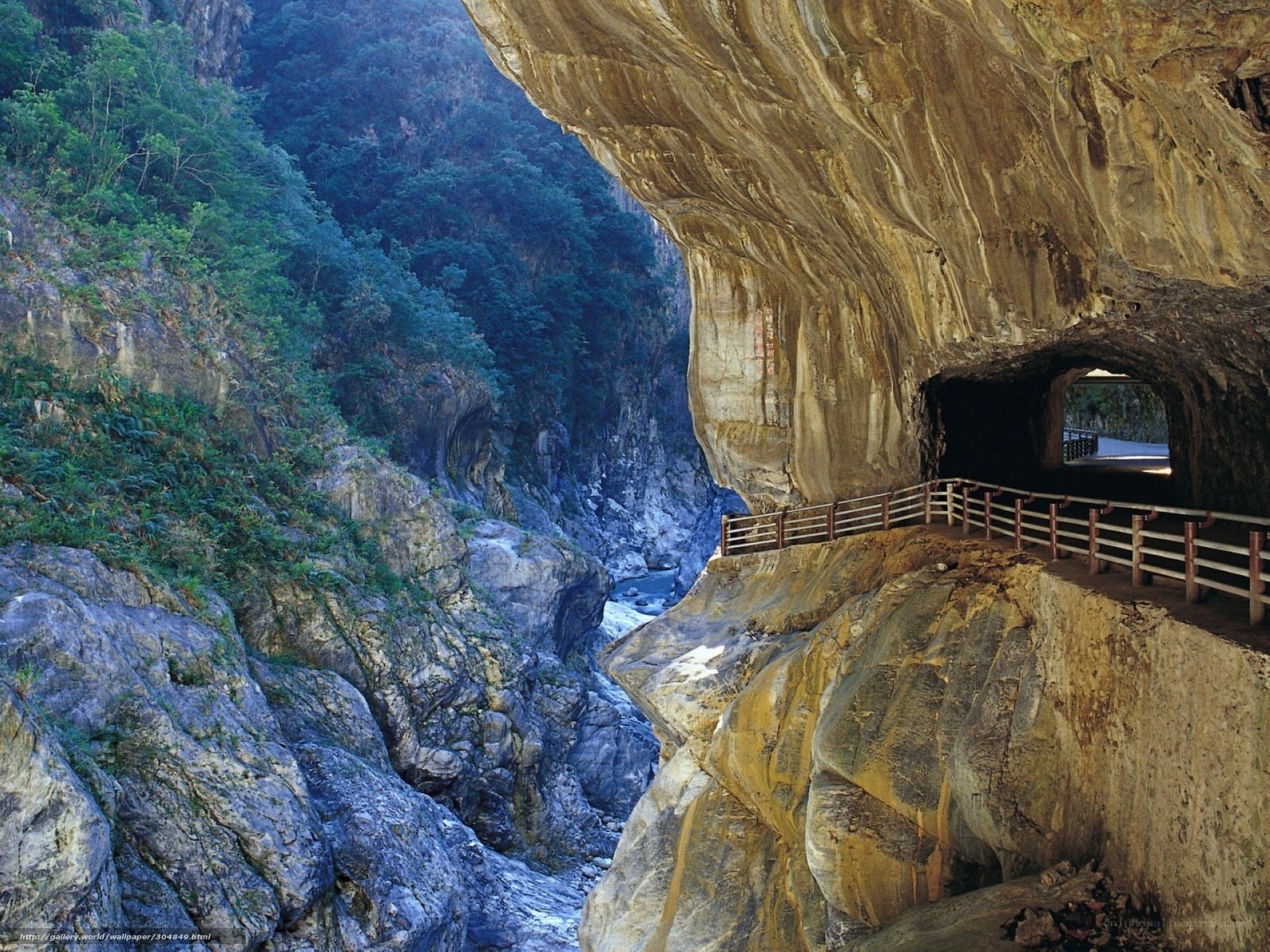 Cave tunnel in a mountain gorge