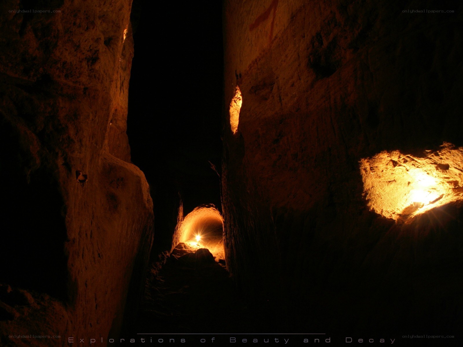 Cave tunnel with torchlight