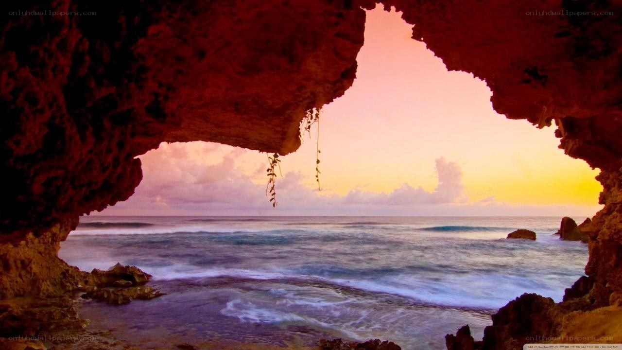 cave view of ocean sunset