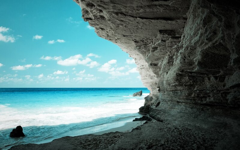 Cave view of turquoise beach