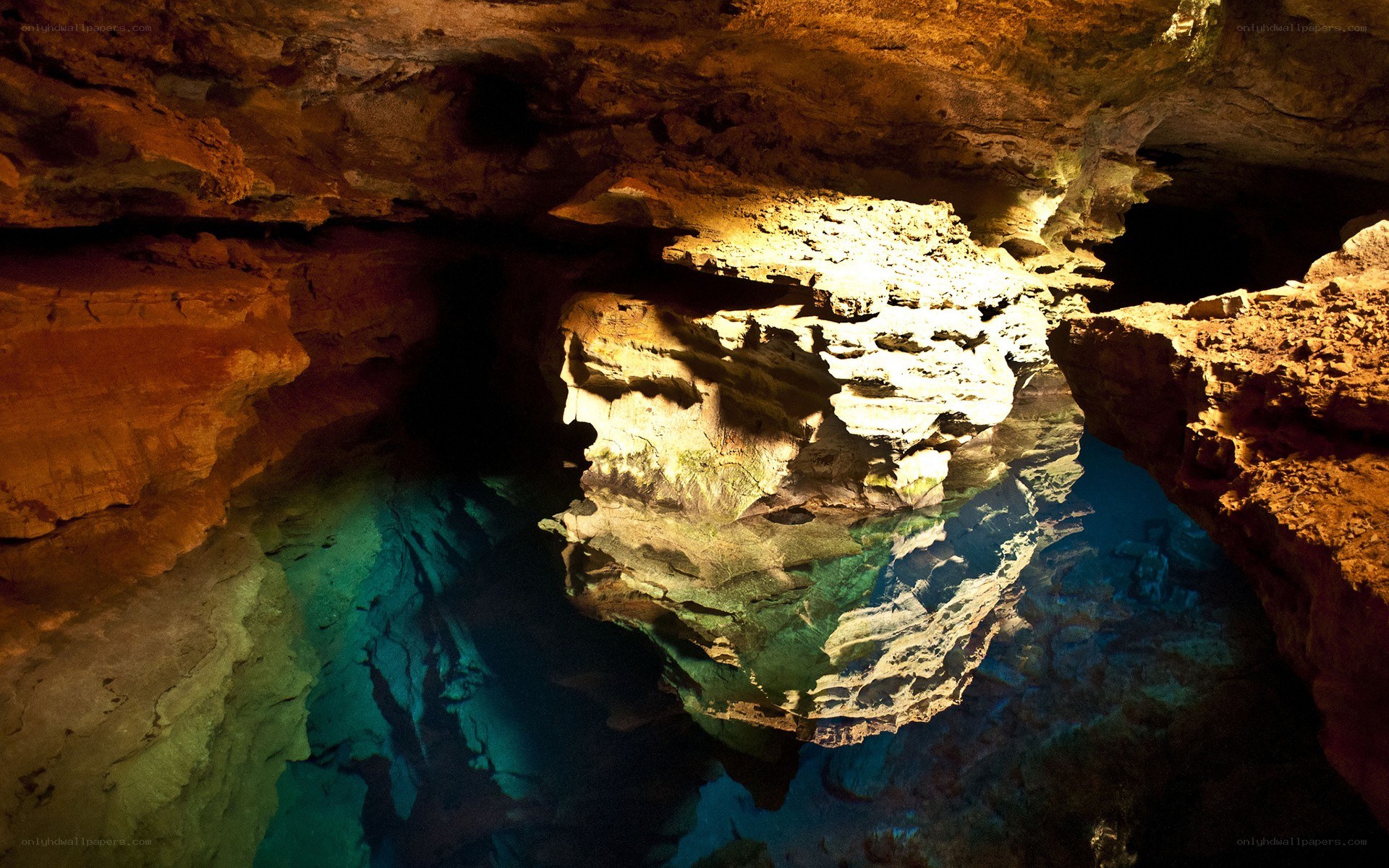 Cave with clear blue water
