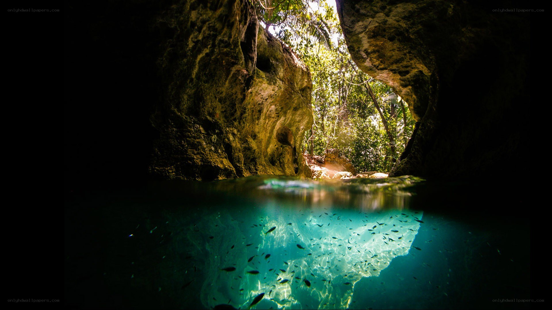 Cave with clear blue water