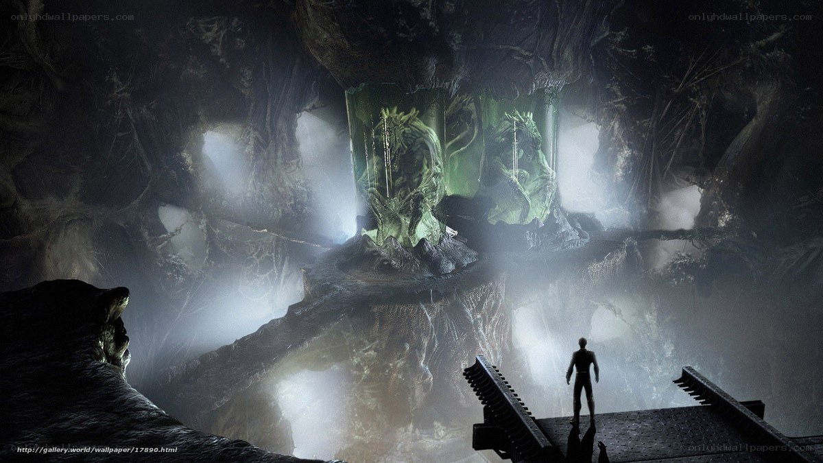 Cave with glowing green statues
