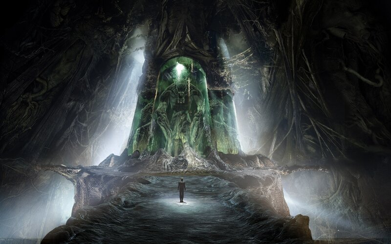 cave with glowing statue
