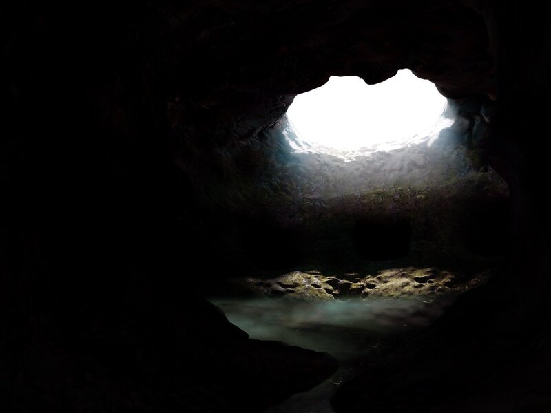 cave with light and water