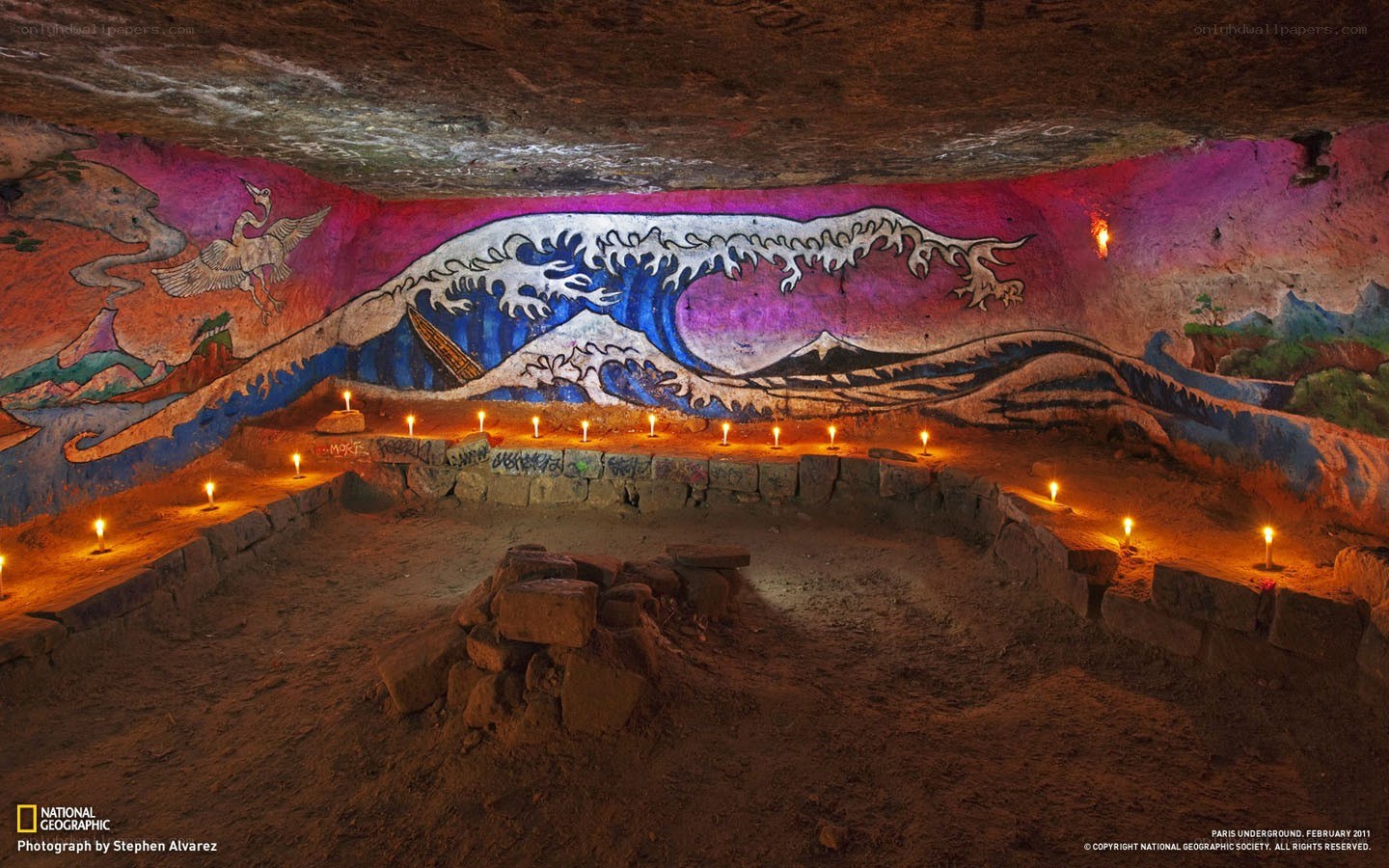 Cave with mural and candles