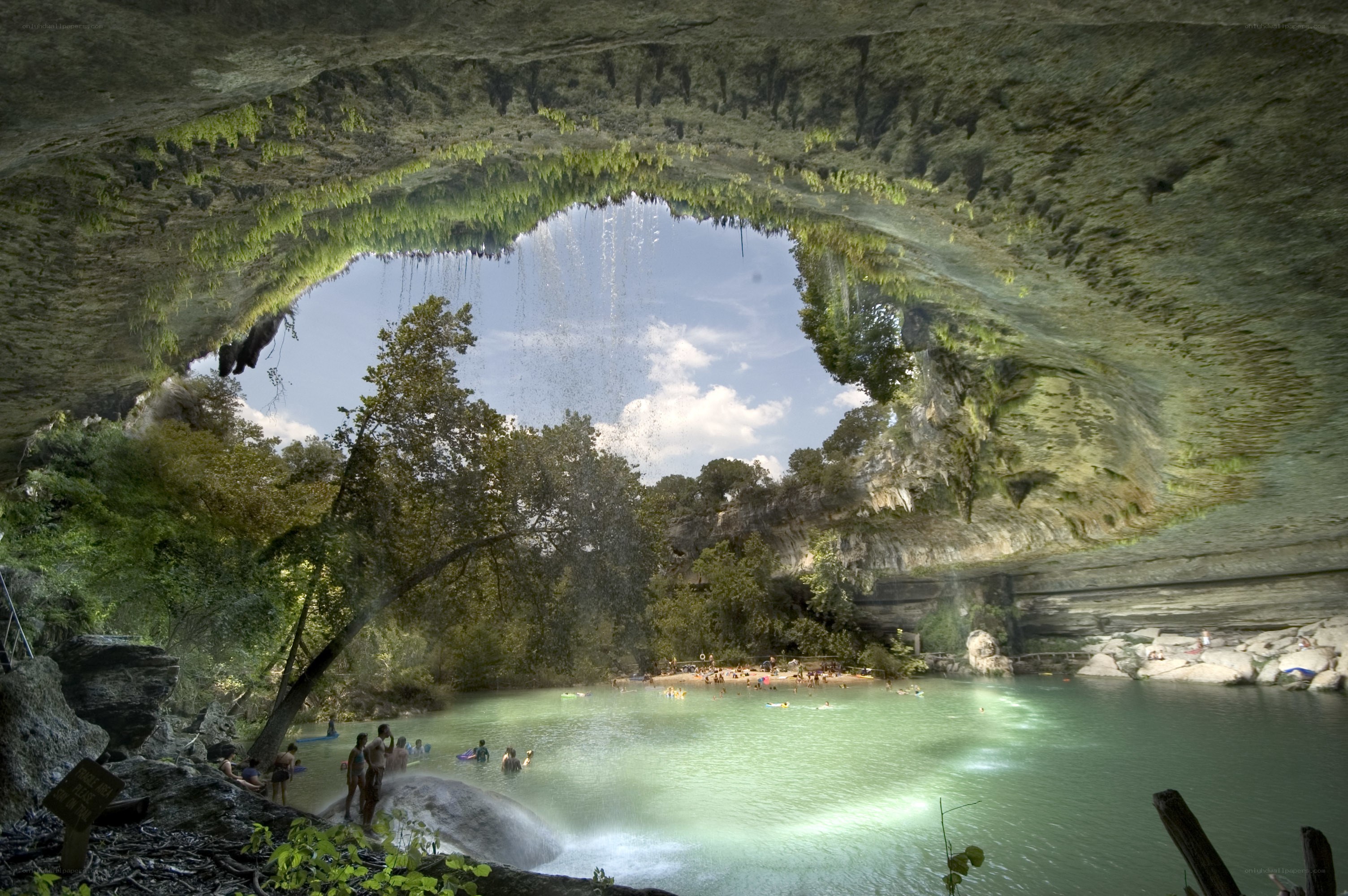 Cave with natural pool and waterfall