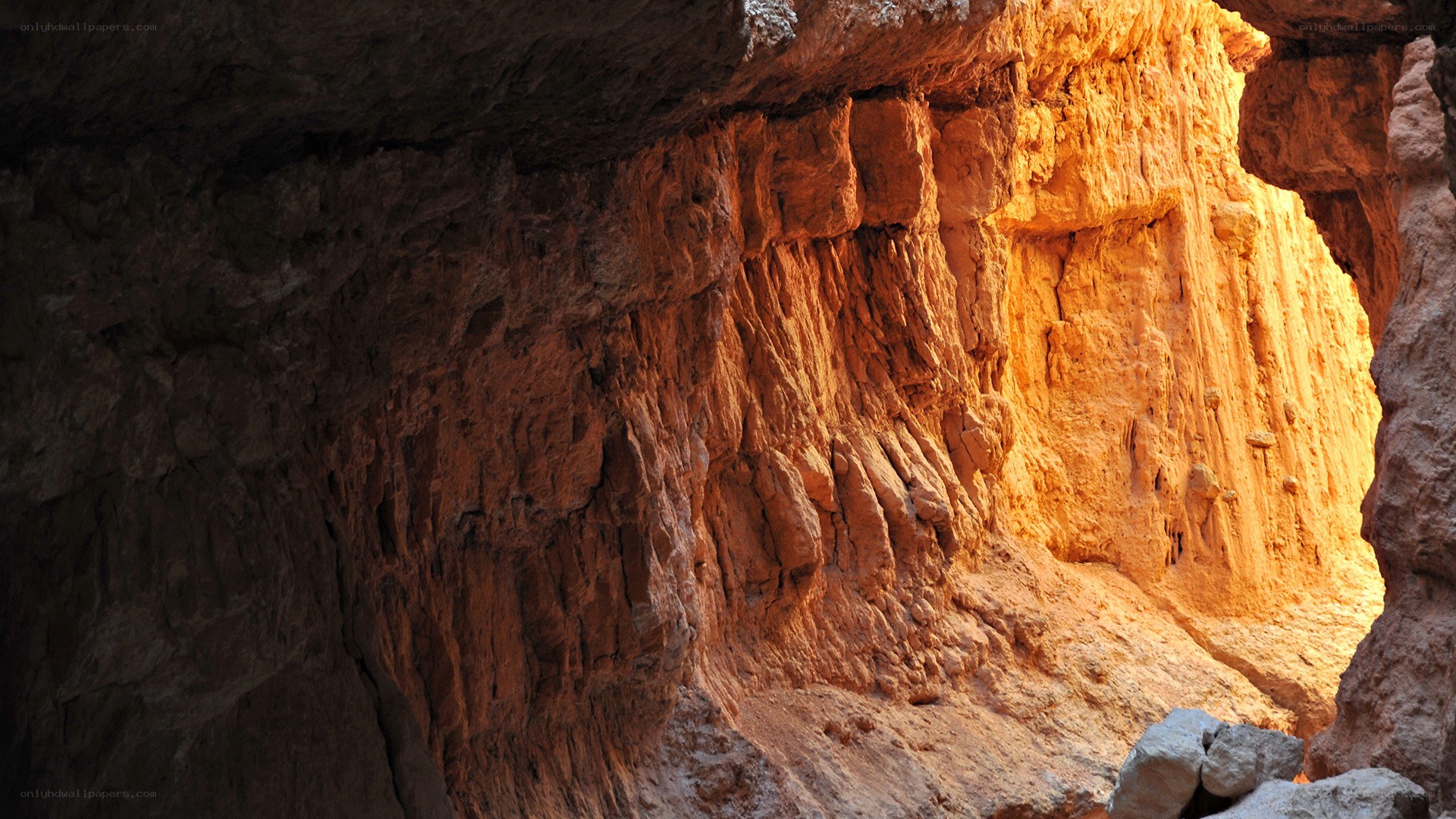 cave with orange rock walls