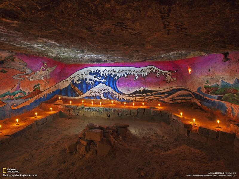 Cave with painted wave mural