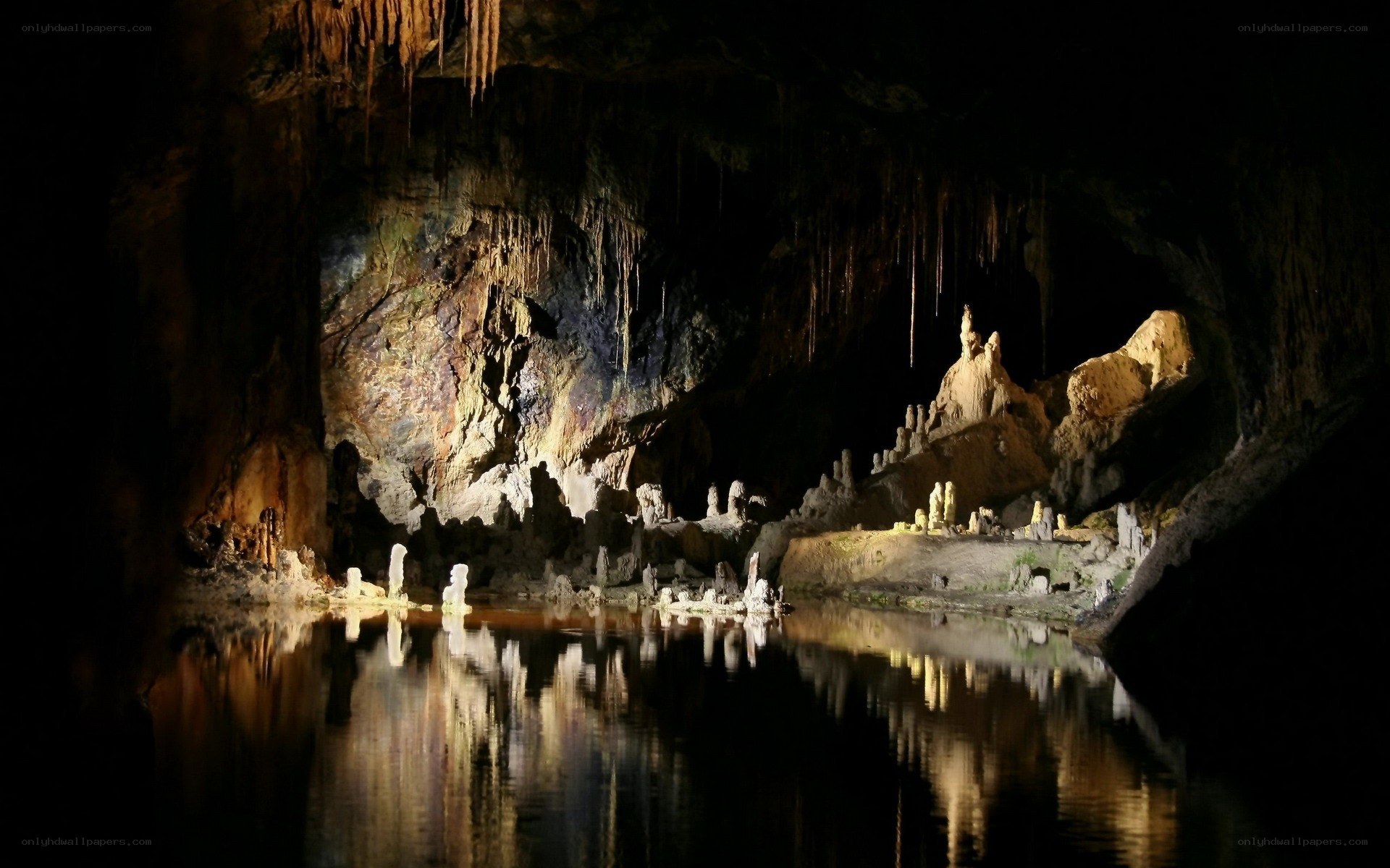 Cave with stalactites and water