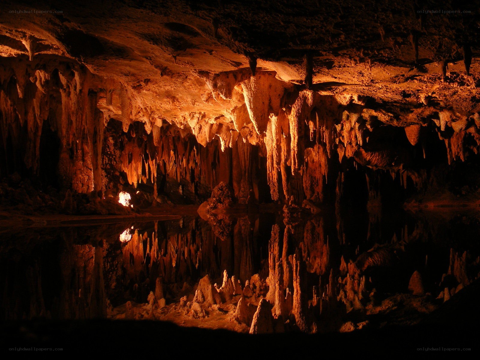 Cave with stalactites and water