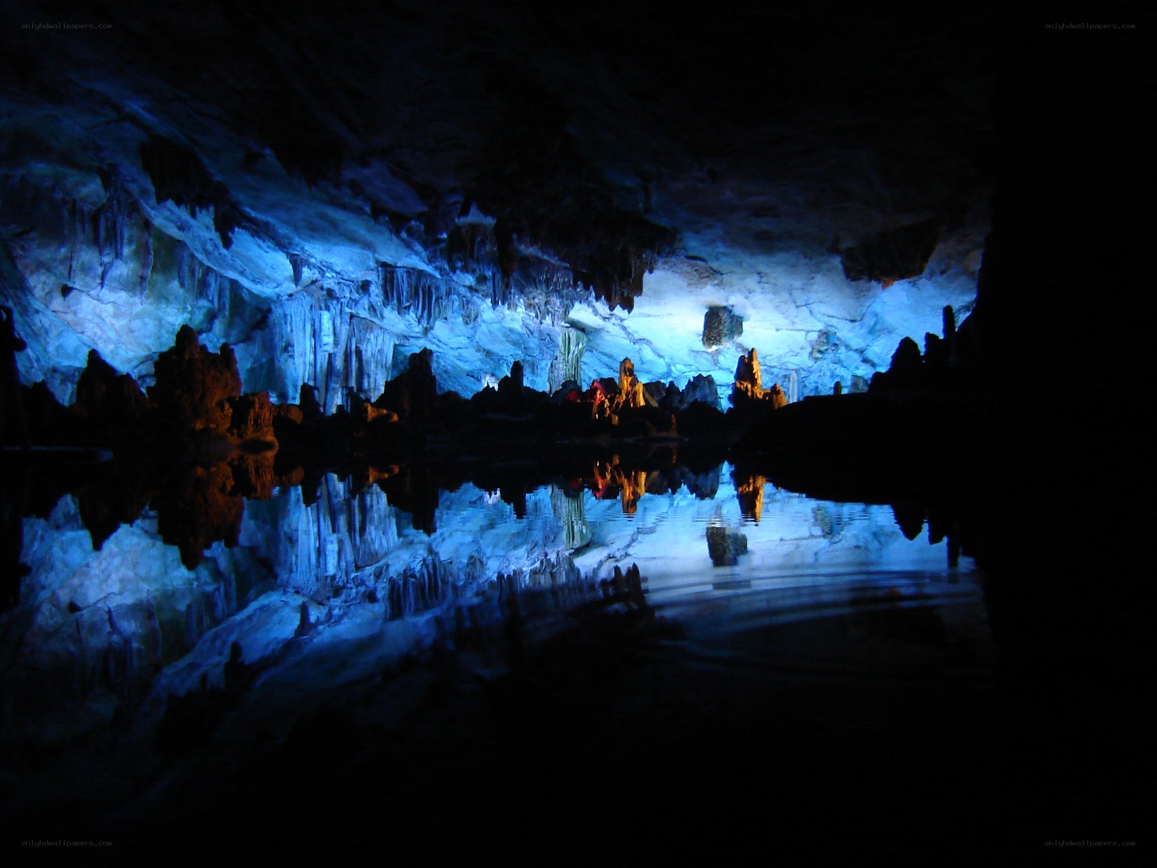 Cave with stalactites and water