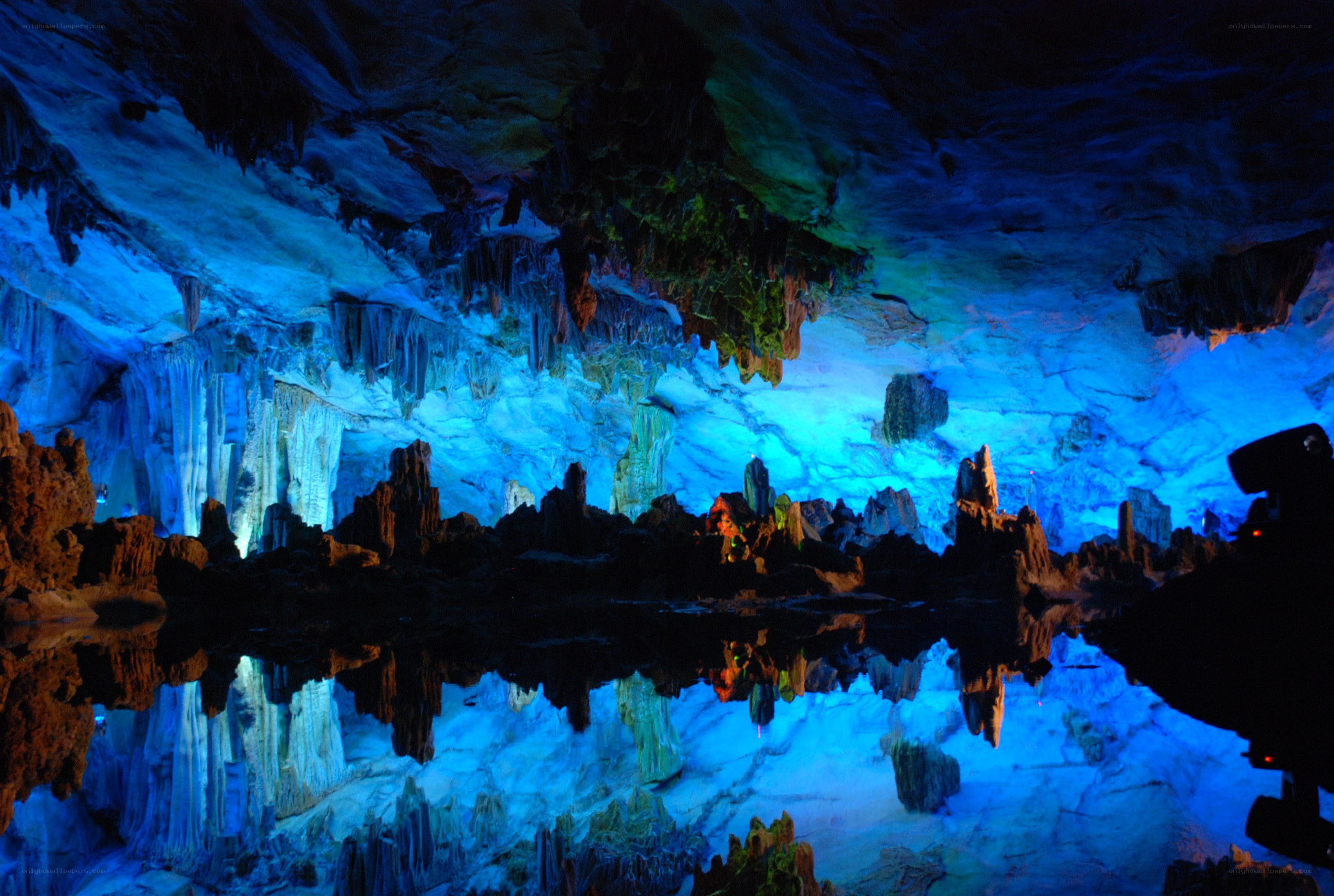 Cave with stalactites and water