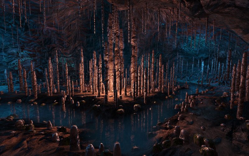 cave with stalagmites and water