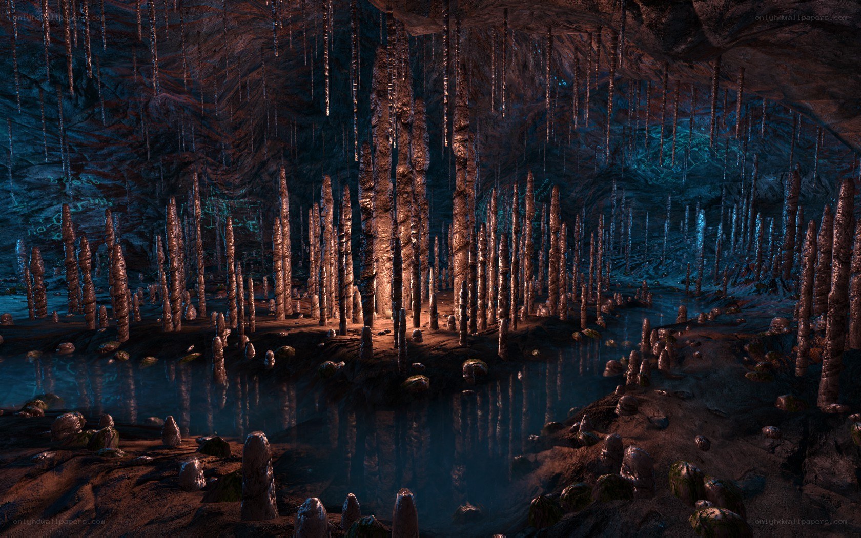 cave with stalagmites and water