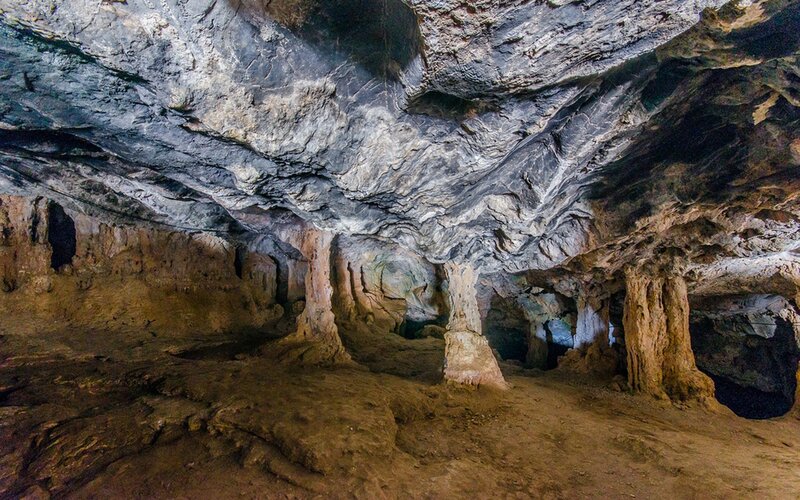Cave with Stalagmites — Brown, Dramatic