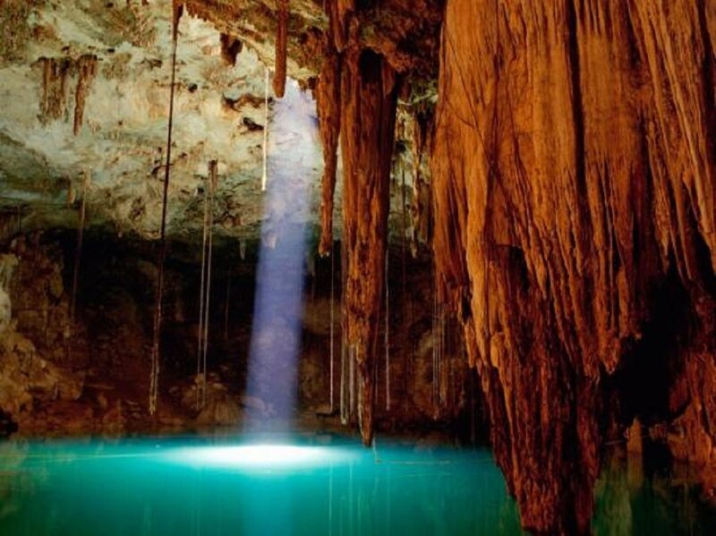 cave with turquoise pool