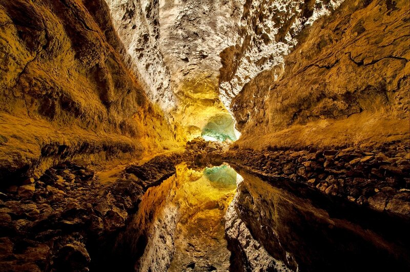 Cave with Water Reflection — Brown