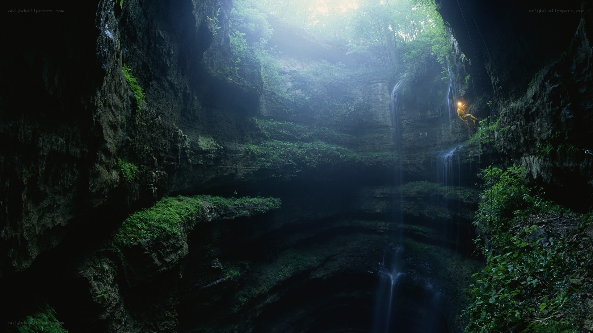 Cave with waterfall and light