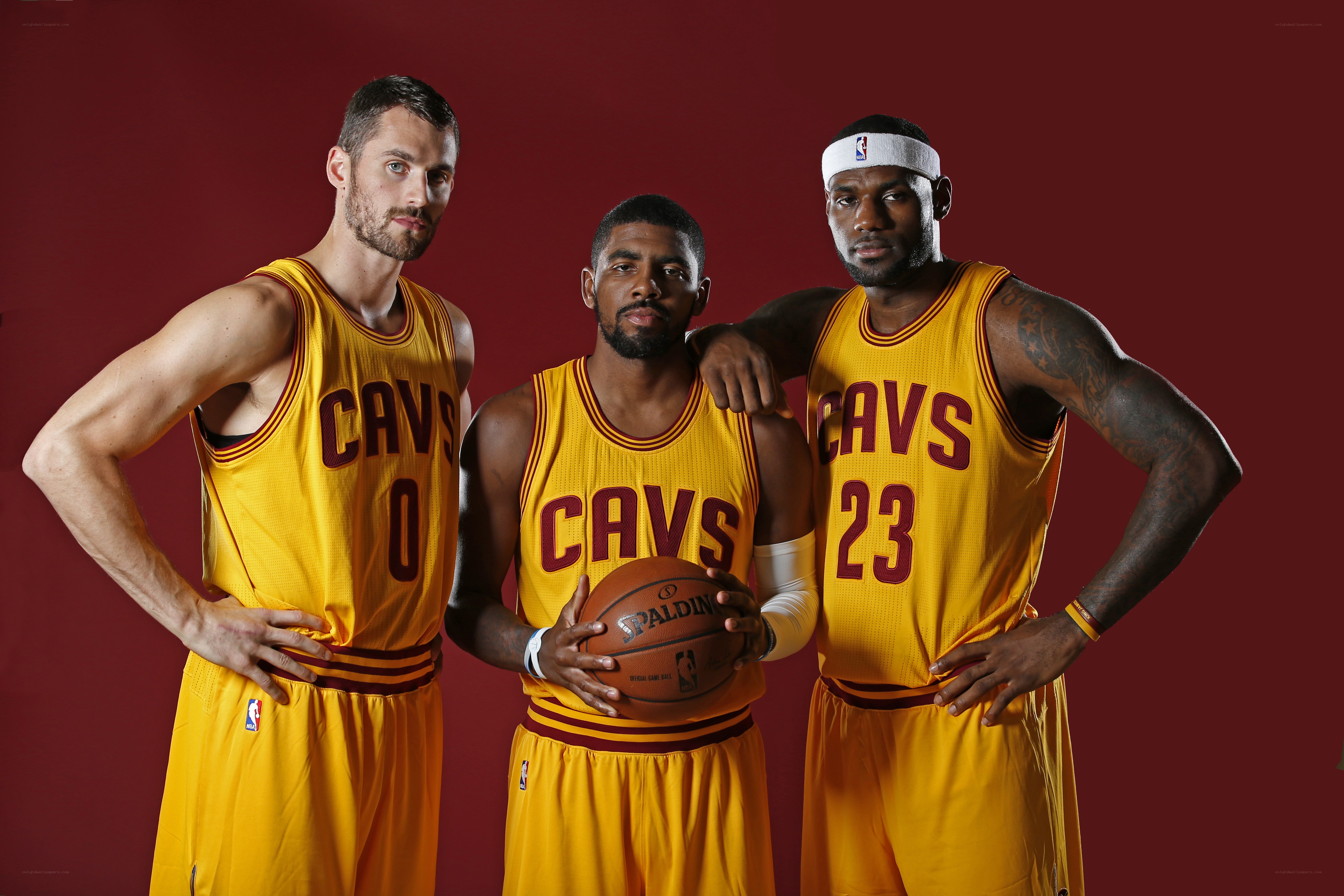 Cavs basketball players pose