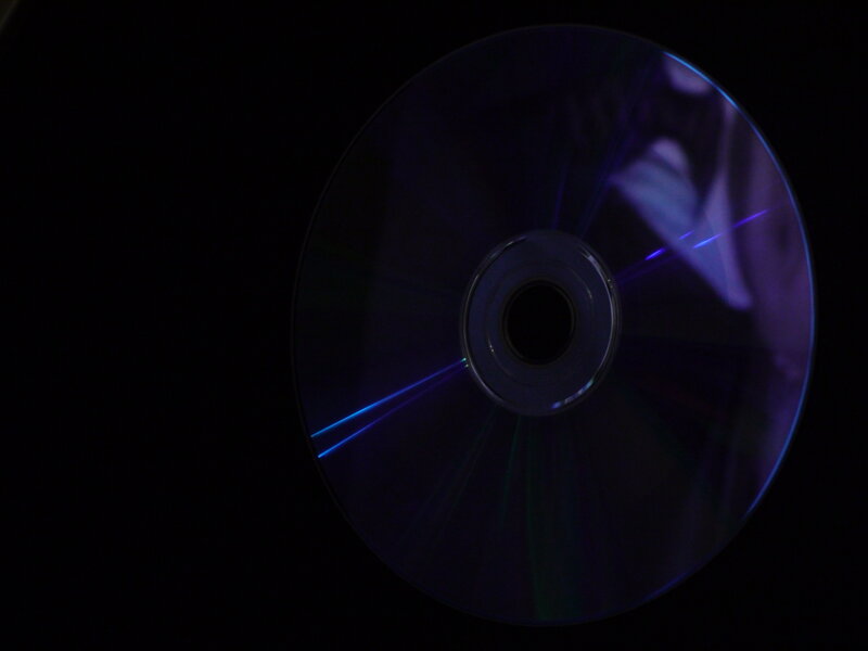 CD with blue light reflection