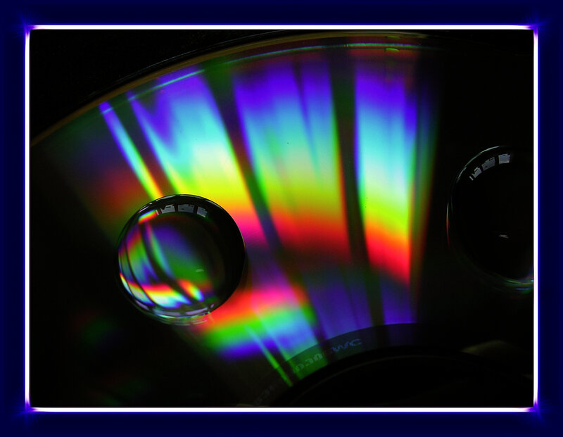 CD with rainbow light refraction