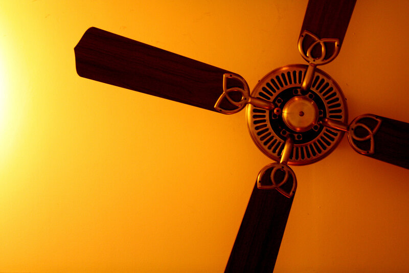 ceiling fan under warm light