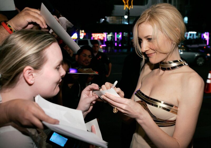 celebrity signing autographs