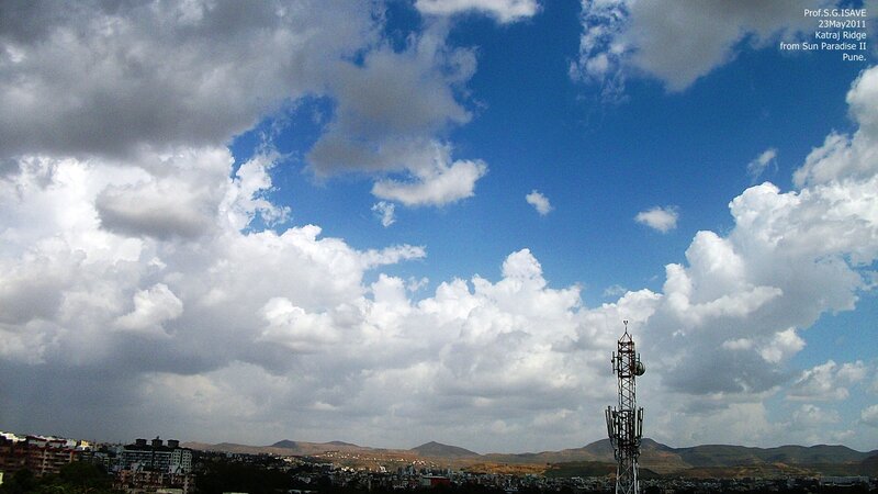 Cell Tower and Cityscape