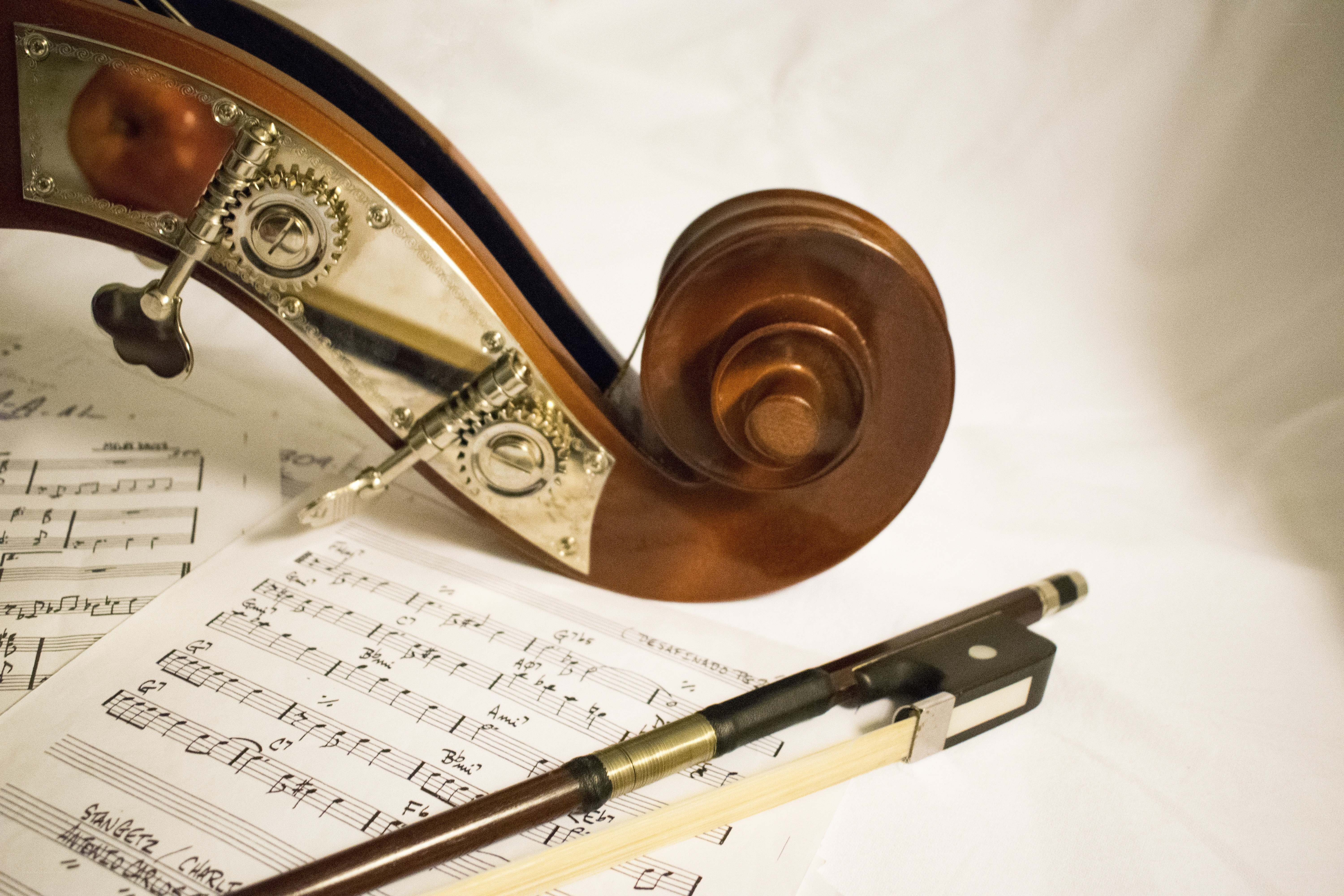 Cello and bow on sheet music