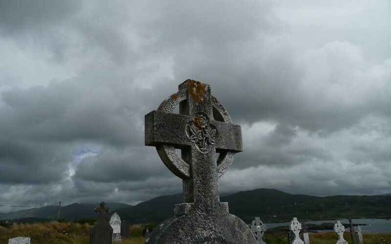 Celtic cross in a coastal cemetery