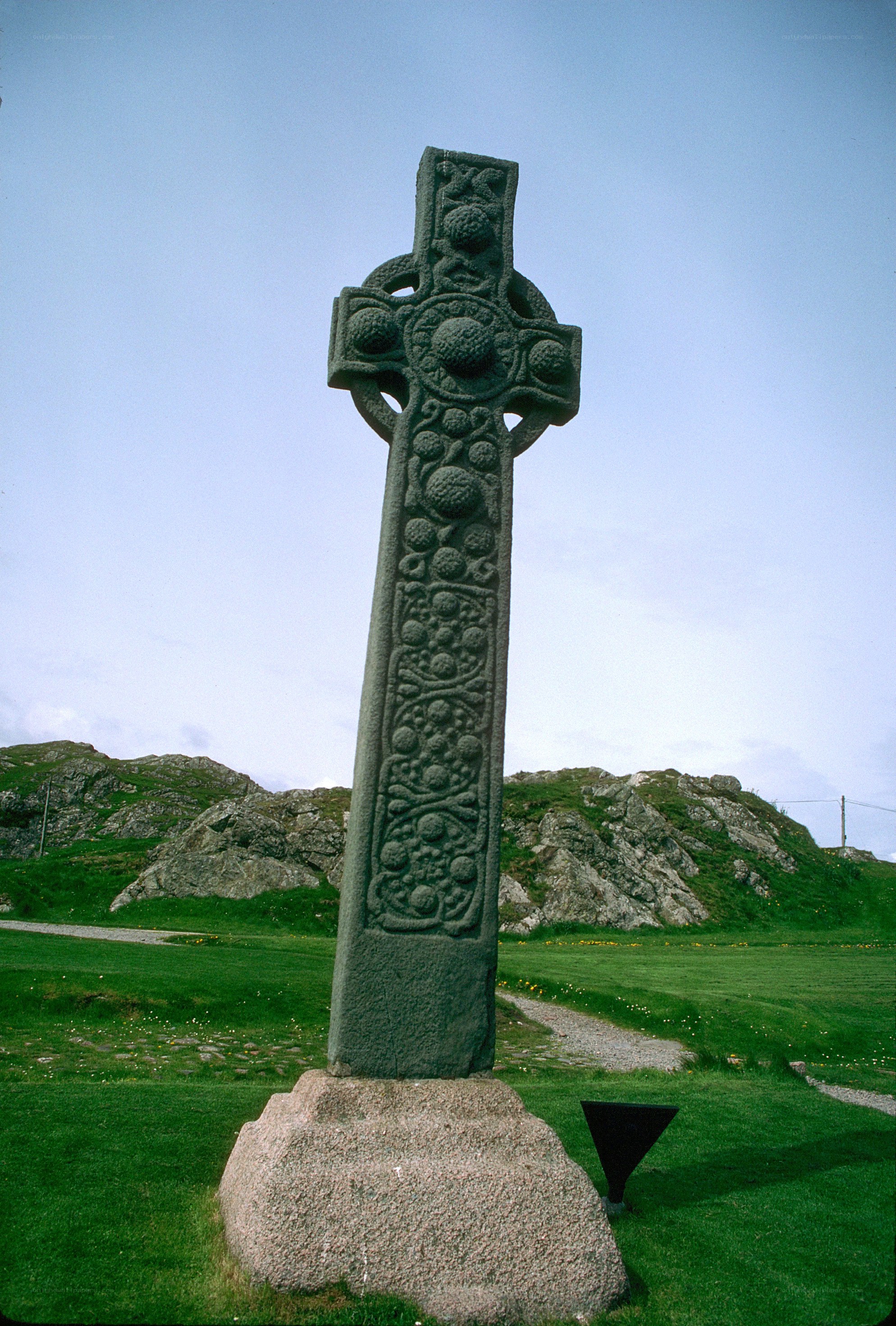 Celtic cross in a grassy field