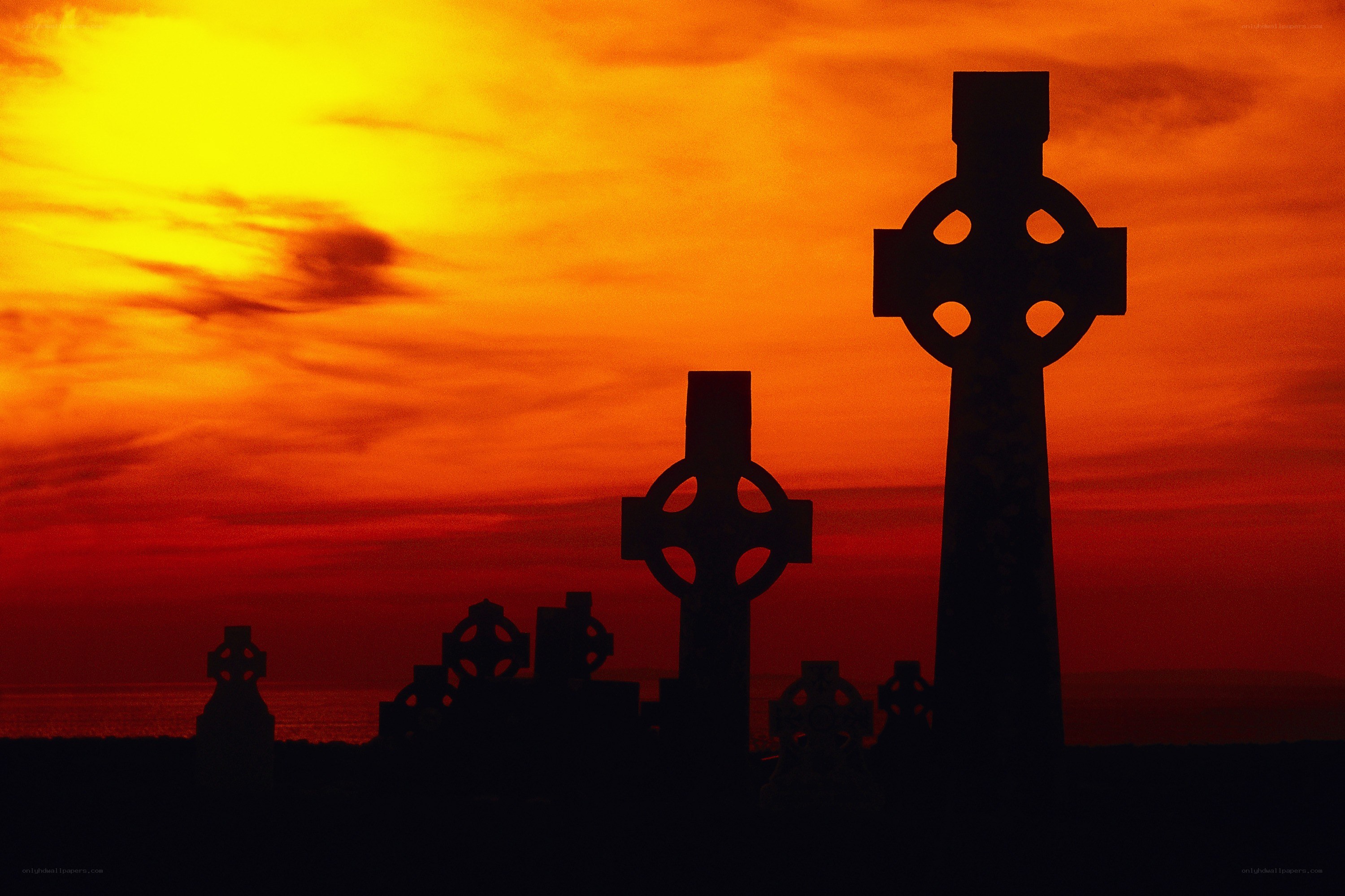 Celtic crosses at sunset