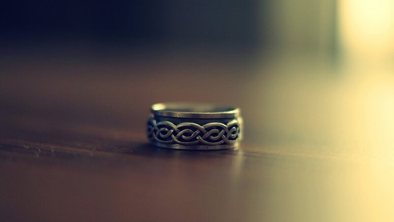 Celtic knot ring on wood